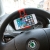 Univerzální držák na volant pro Apple iPhone a další zařízení do šíře cca 8,5cm - černo-červený